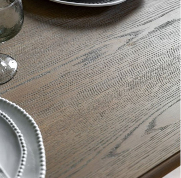 Close up of the beautiful wooden grain on the top of the extendable dining table top