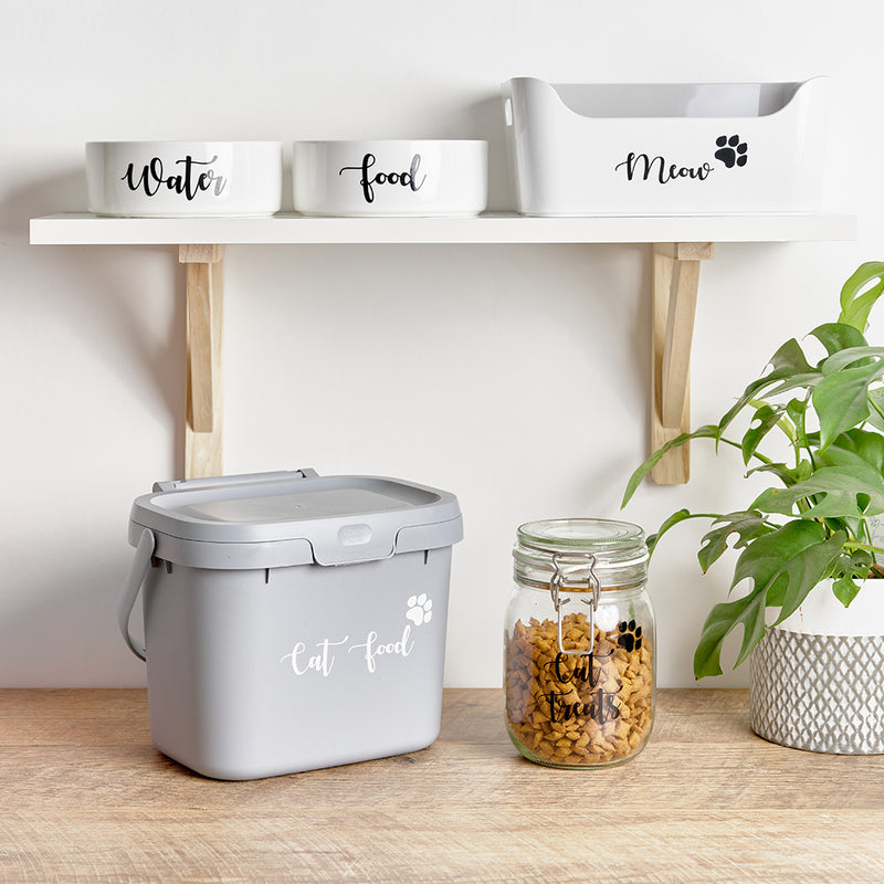 Pet bowls with personalised wording on the face for Food and Water, and a pet jar for treats with Cat Treats, a custom storage box and a Cat Food storage caddie 